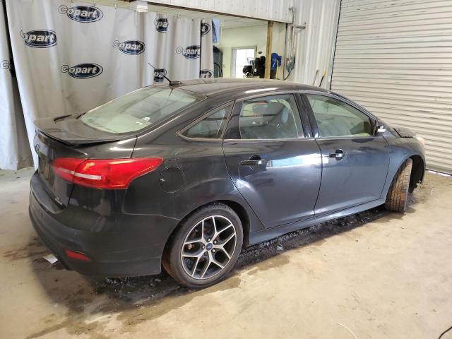 Photo 3 from auction – 2015 FORD FOCUS SE with VIN 1FADP3F22FL208966