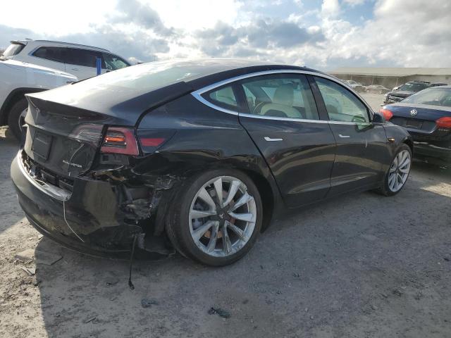 Photo 3 from auction – 2020 TESLA MODEL 3 with VIN 5YJ3E1EB2LF622409