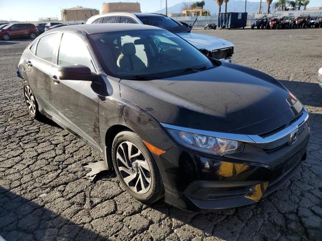 Photo 4 from auction – 2016 HONDA CIVIC EX with VIN 2HGFC2F70GH559475