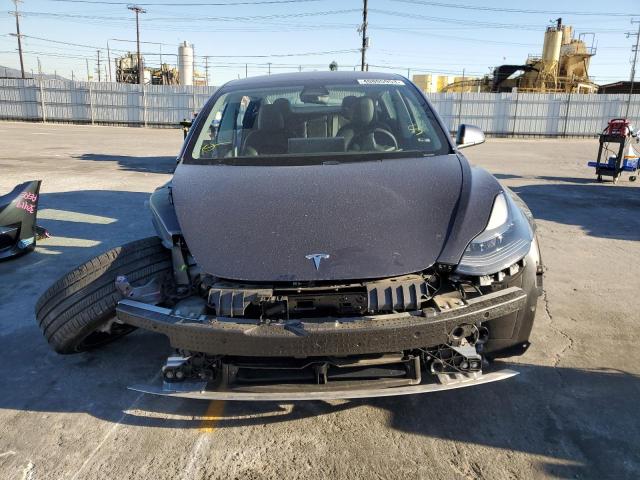 Photo 5 from auction – 2021 TESLA MODEL 3 with VIN 5YJ3E1EA6MF016541