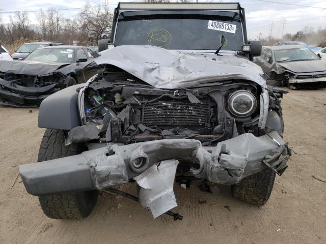 Photo 5 from auction – 2014 JEEP WRANGLER U with VIN 1C4BJWDG0EL268861