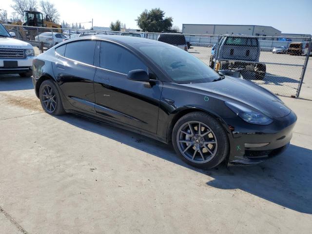 Photo 4 from auction – 2022 TESLA MODEL 3 with VIN 5YJ3E1EB8NF124170
