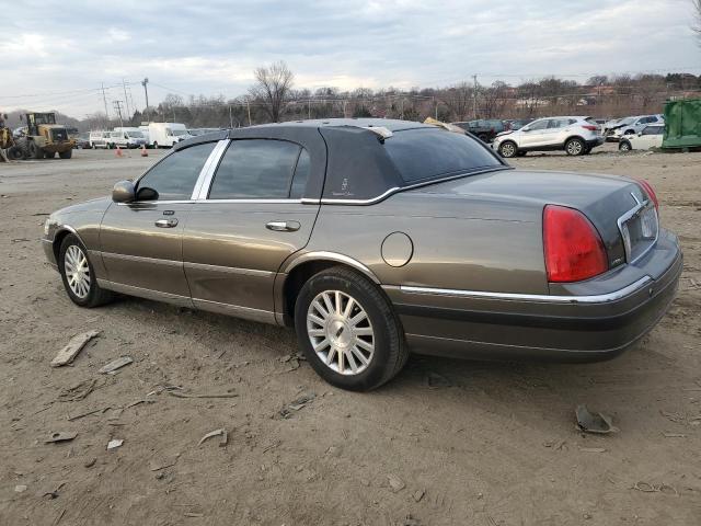 Photo 2 from auction – 2004 LINCOLN TOWN CAR E with VIN 1LNHM81WX4Y633102