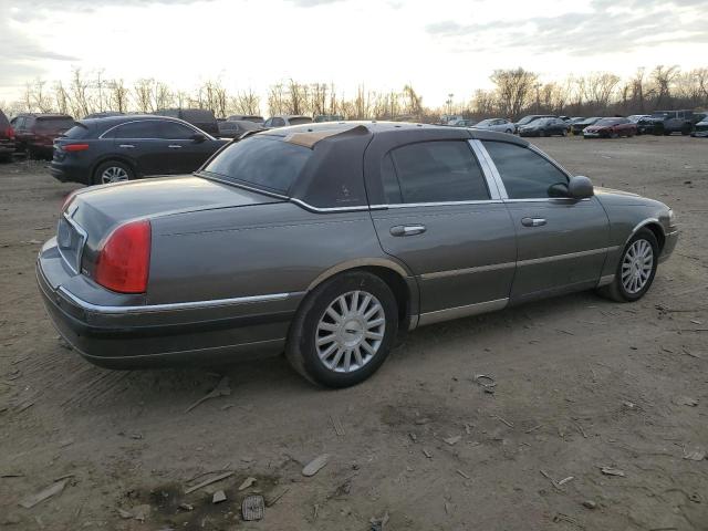 Photo 3 from auction – 2004 LINCOLN TOWN CAR E with VIN 1LNHM81WX4Y633102