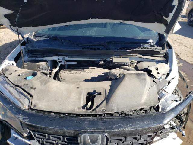 Photo 12 from auction – 2021 HONDA PASSPORT S with VIN 5FNYF8H23MB024953