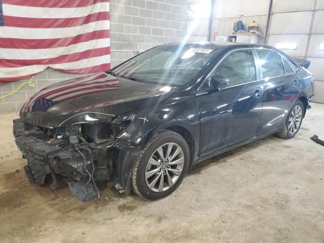 TOYOTA CAMRY LE 2016 with VIN 4T4BF1FKXGR570923 - Photo from auction