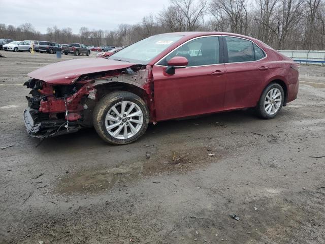 TOYOTA CAMRY LE 2022 with VIN 4T1C11BK6NU066448 - Photo from auction