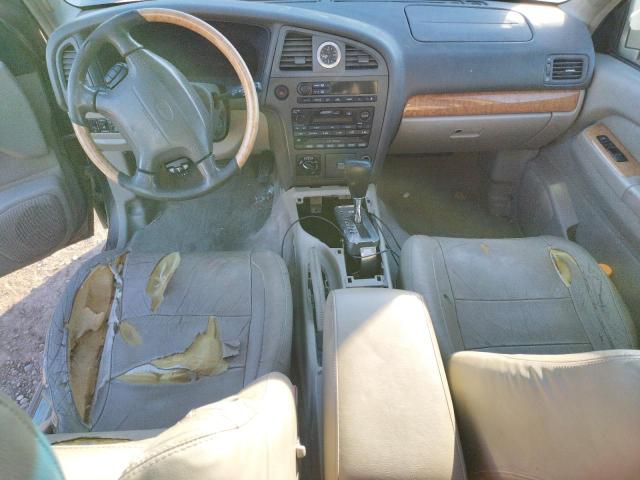Photo 8 from auction – 2001 INFINITI QX4 with VIN JNRDR07Y01W109611