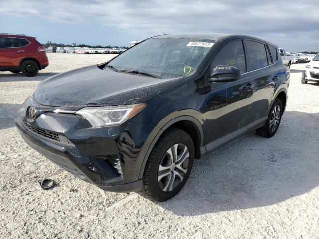TOYOTA RAV4 LE 2018 with VIN 2T3ZFREV2JW437252 - Photo from auction
