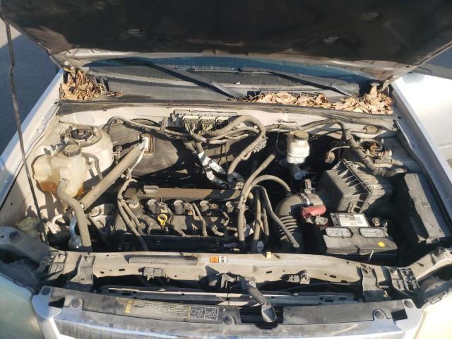 Photo 12 from auction – 2010 MAZDA TRIBUTE I with VIN 4F2CY0C74AKM07064