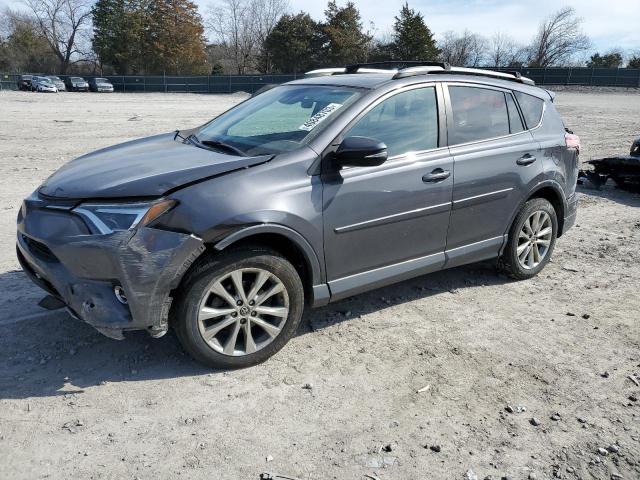 Photo 1 from auction – 2018 TOYOTA RAV4 LIMIT with VIN 2T3DFREV9JW729216