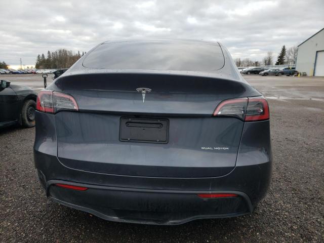 Photo 6 from auction – 2022 TESLA MODEL Y with VIN 7SAYGDEE4NF521518