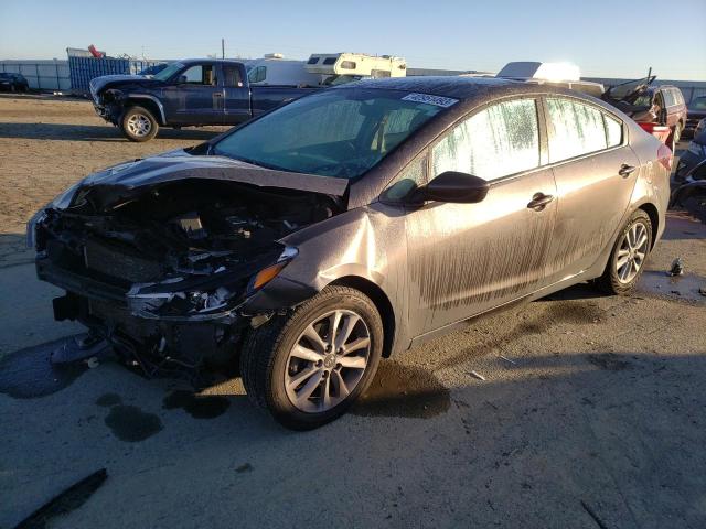KIA FORTE LX 2017 with VIN 3KPFL4A75HE148801 - Photo from auction