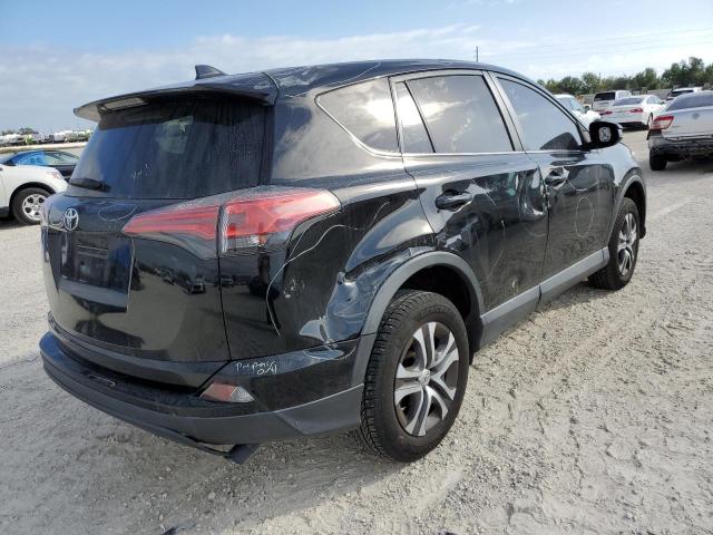 Photo 3 from auction – 2018 TOYOTA RAV4 LE with VIN 2T3ZFREV2JW437252