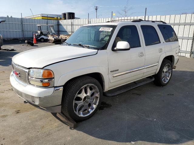 GMC YUKON 2001 with VIN 1GKEC13TX1J179298 - Photo from auction