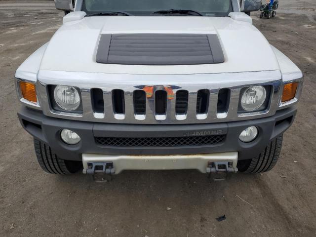 Photo 12 from auction – 2009 HUMMER H3 with VIN 5GTEN13E598112952
