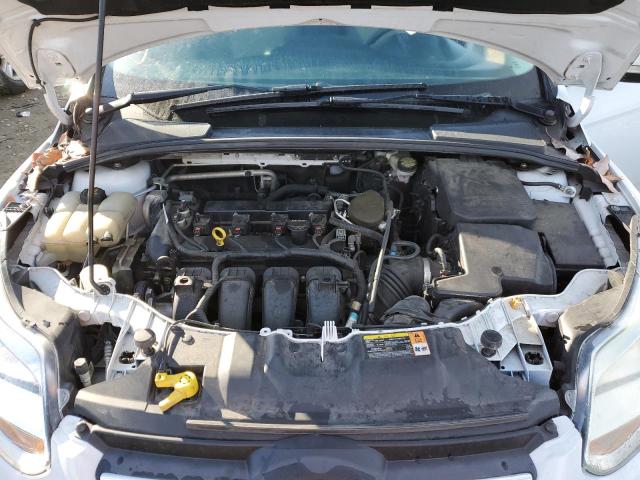 Photo 11 from auction – 2014 FORD FOCUS SE with VIN 1FADP3F21EL135006