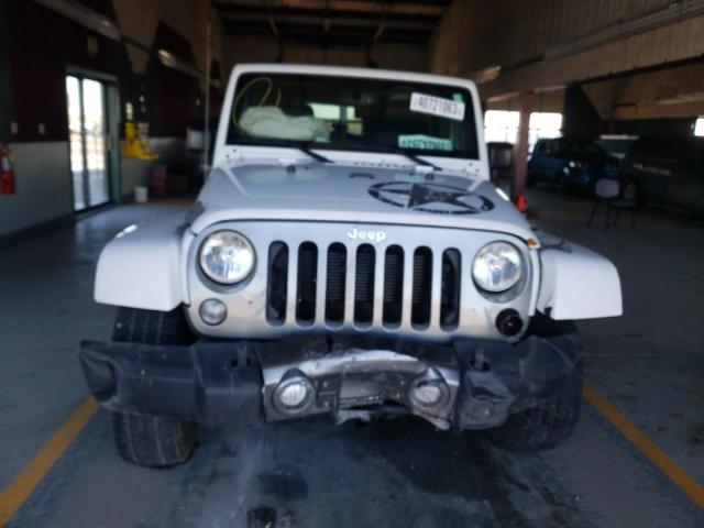 Photo 5 from auction – 2015 JEEP WRANGLER U with VIN 1C4BJWDG4FL636265