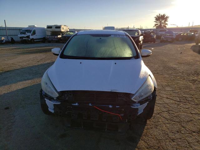 Photo 5 from auction – 2015 FORD FOCUS SE with VIN 1FADP3F25FL262035
