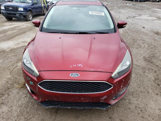 Foto 5 de la subasta – 2015 FORD FOCUS SE con VIN 1FADP3K26FL286835