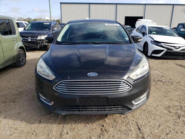Photo 5 from auction – 2015 FORD FOCUS TITA with VIN 1FADP3J28FL328150