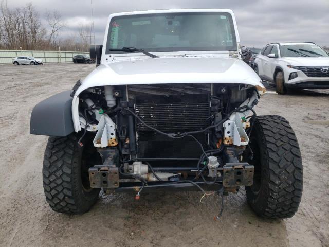 Photo 5 from auction – 2016 JEEP WRANGLER U with VIN 1C4BJWFG8GL255470