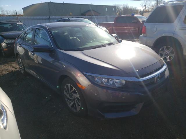 Photo 4 from auction – 2017 HONDA CIVIC EX with VIN 2HGFC2F70HH574754