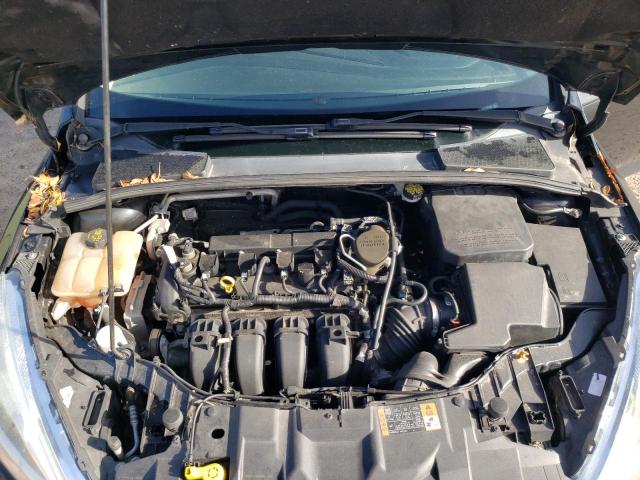 Photo 11 from auction – 2015 FORD FOCUS TITA with VIN 1FADP3J28FL328150