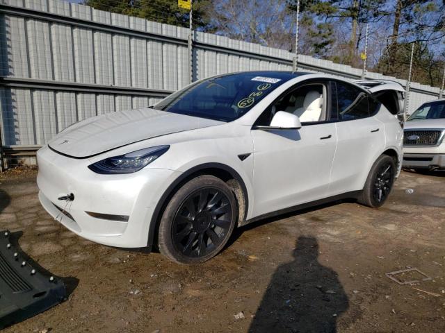 TESLA MODEL Y 2022 with VIN 7SAYGDEE8NF420675 - Photo from auction