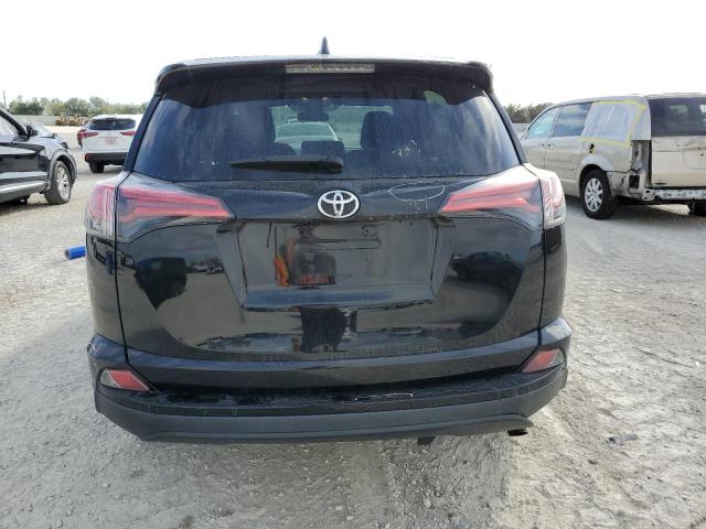 Photo 6 from auction – 2018 TOYOTA RAV4 LE with VIN 2T3ZFREV2JW437252