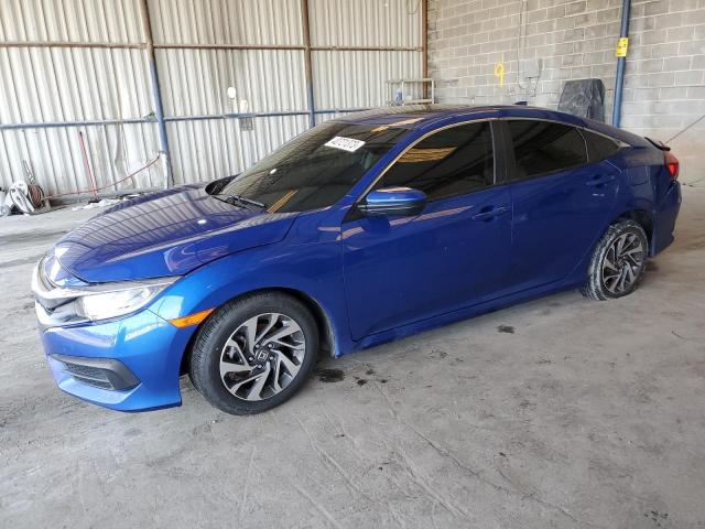 HONDA CIVIC EX 2018 with VIN 19XFC2F72JE026559 - Photo from auction