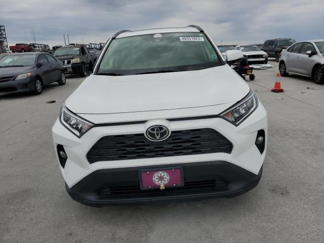 Photo 5 from auction – 2020 TOYOTA RAV4 XLE with VIN JTMP1RFV7LD066187