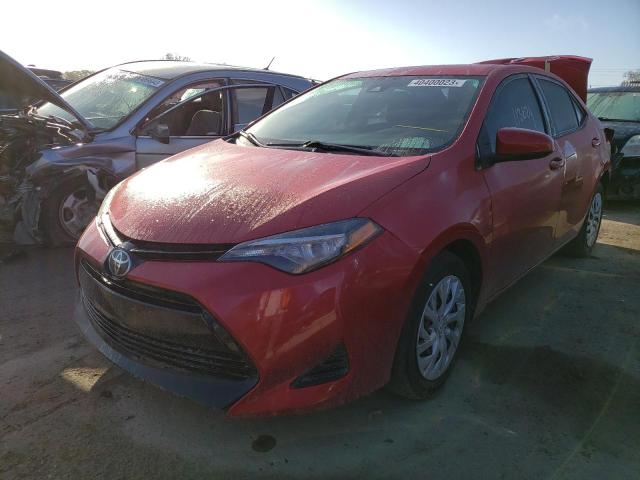 TOYOTA COROLLA L 2018 with VIN 5YFBURHE2JP764943 - Photo from auction