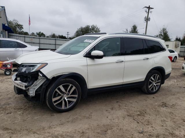 Photo 1 from auction – 2016 HONDA PILOT TOUR with VIN 5FNYF5H9XGB038560