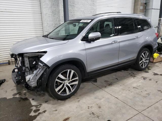 HONDA PILOT TOUR 2016 with VIN 5FNYF6H97GB111549 - Photo from auction