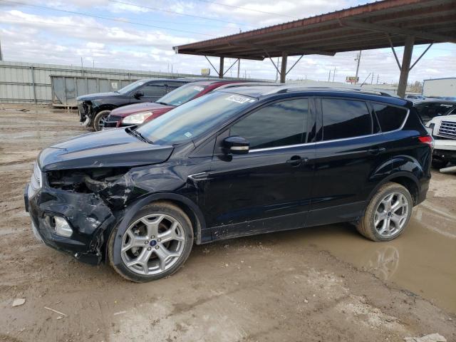 FORD ESCAPE TIT 2018 with VIN 1FMCU0J97JUC06047 - Photo from auction