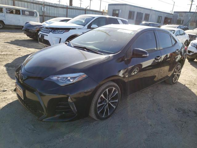 TOYOTA COROLLA L 2017 with VIN 5YFBURHE1HP713749 - Photo from auction