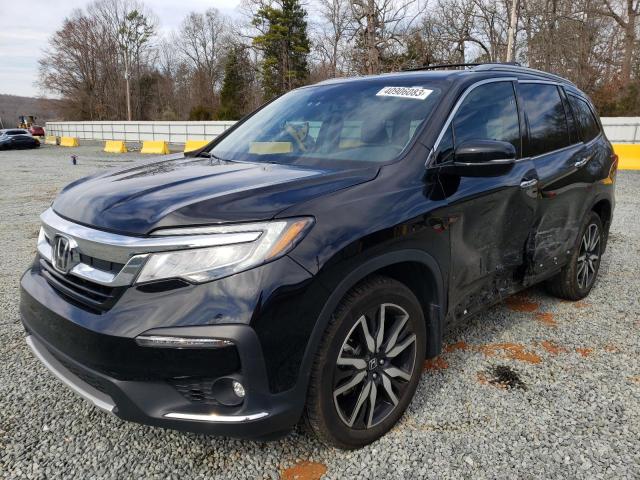 HONDA PILOT TOUR 2019 with VIN 5FNYF6H95KB100381 - Photo from auction