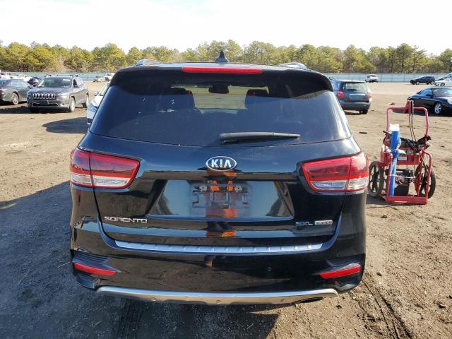 Photo 6 from auction – 2016 KIA SORENTO SX with VIN 5XYPKDA11GG033455