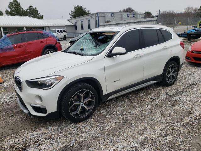 BMW X1 XDRIVE2 2018 with VIN WBXHT3C30J5F90437 - Photo from auction