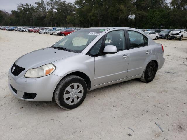 SUZUKI SX4 LE 2010 with VIN JS2YC5A25A6301097 - Photo from auction