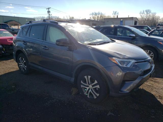 Photo 4 from auction – 2017 TOYOTA RAV4 LE with VIN JTMZFREV0HJ715168