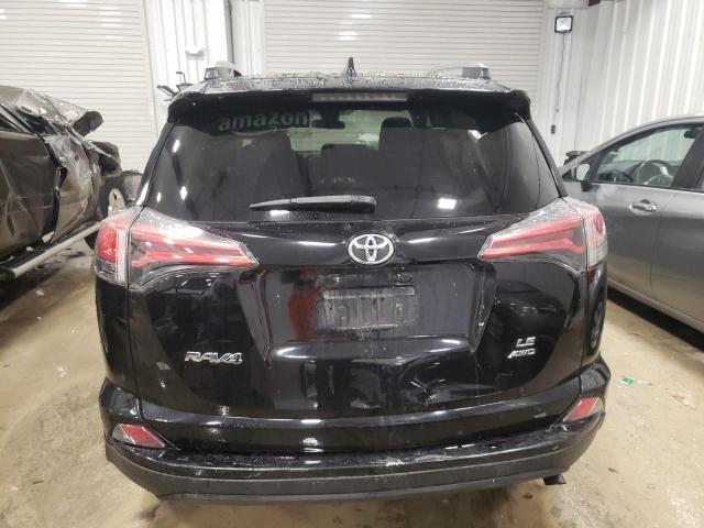 Photo 6 from auction – 2018 TOYOTA RAV4 LE with VIN 2T3BFREV4JW716073
