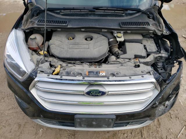 Photo 12 from auction – 2018 FORD ESCAPE TIT with VIN 1FMCU0J97JUC06047