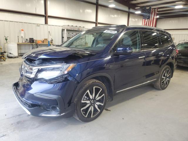 HONDA PILOT TOUR 2021 with VIN 5FNYF5H98MB008436 - Photo from auction
