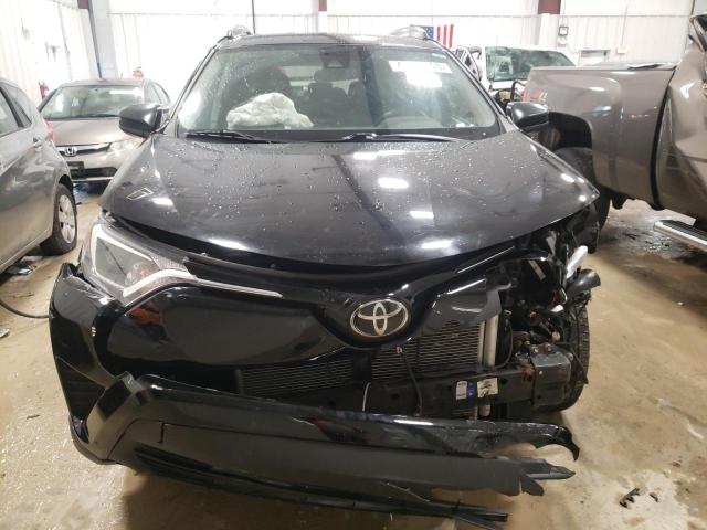 Photo 5 from auction – 2018 TOYOTA RAV4 LE with VIN 2T3BFREV4JW716073