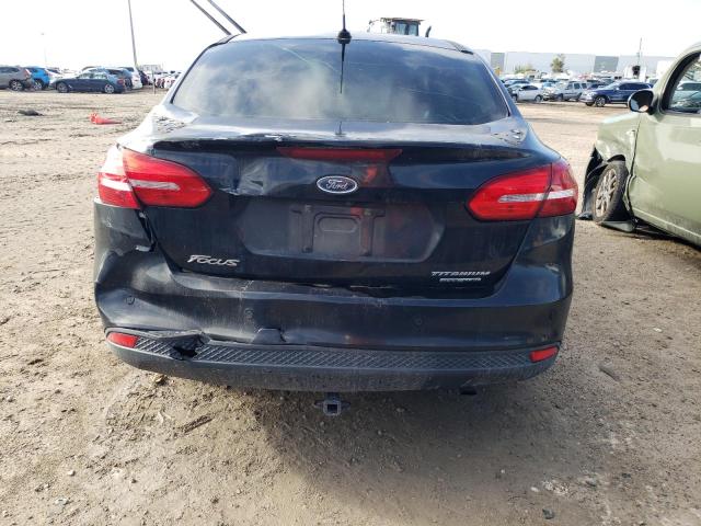 Photo 6 from auction – 2015 FORD FOCUS TITA with VIN 1FADP3J28FL328150