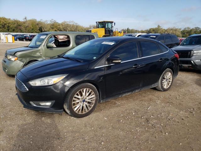 FORD FOCUS TITA 2015 with VIN 1FADP3J28FL328150 - Photo from auction