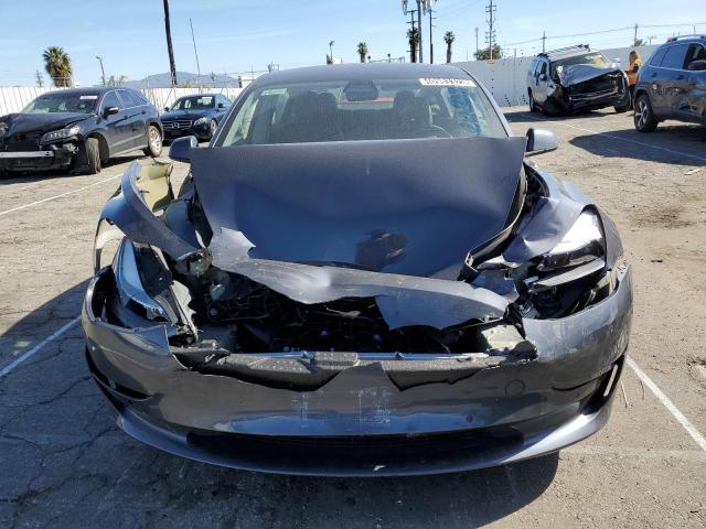 Photo 5 from auction – 2022 TESLA MODEL 3 with VIN 5YJ3E1EB5NF145171