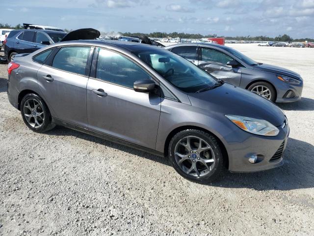 Foto 4 de la subasta – 2013 FORD FOCUS SE con VIN 1FADP3F24DL317829
